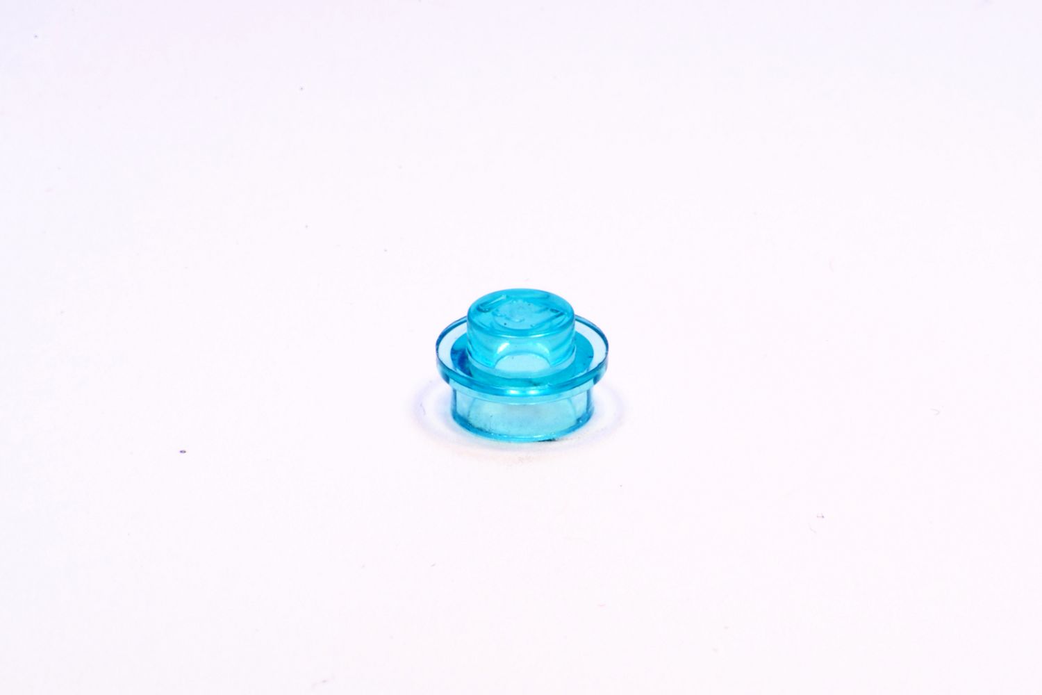 1x1 Rundstein flach transparent-hellblau