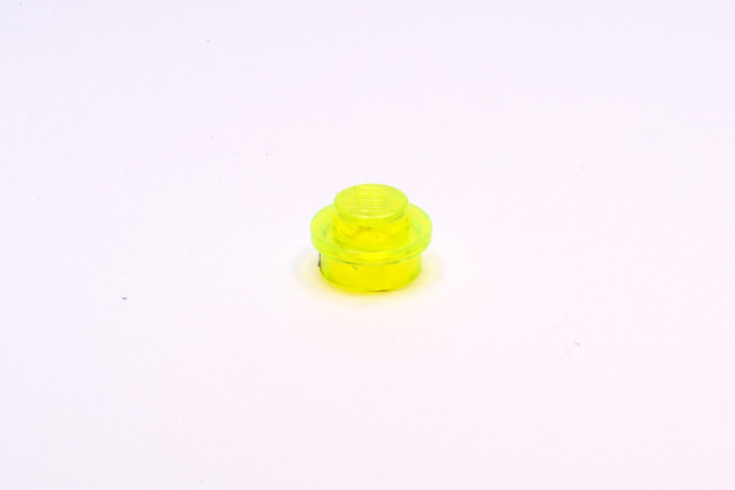 1x1 Rundstein flach transparent-neongelb